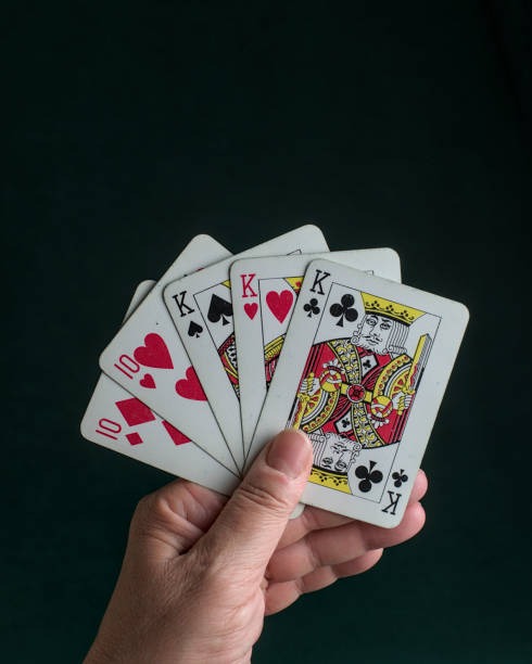 Microgaming live dealer table shown on mobile screen with dealer interaction buttons